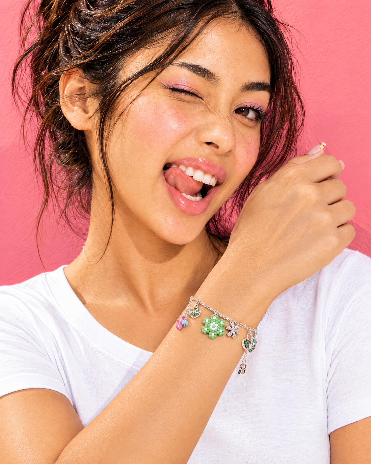 Model wearing the Butterfly Crown Charm Bracelet