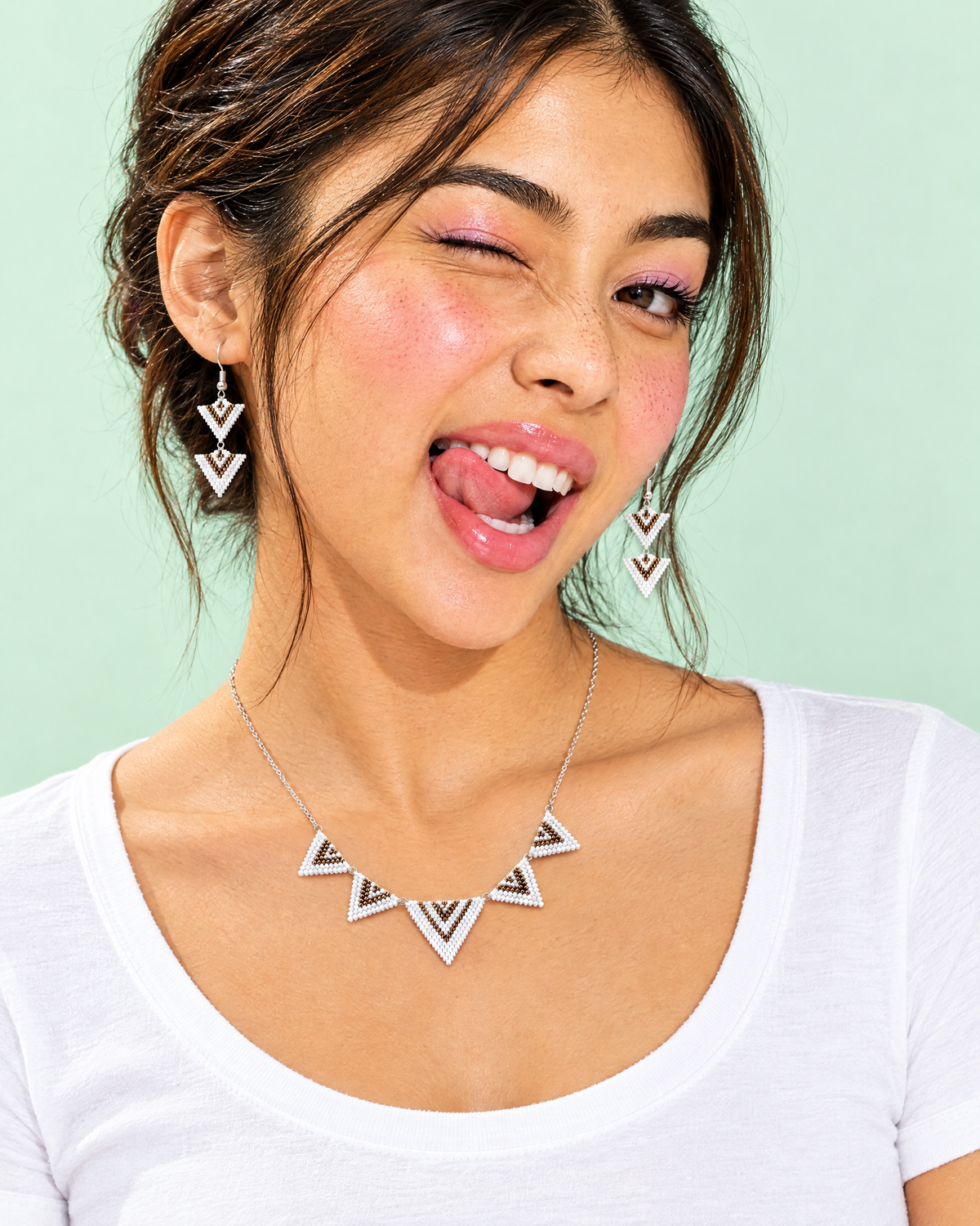 Model wearing the Chevron Triangle necklace and earrings