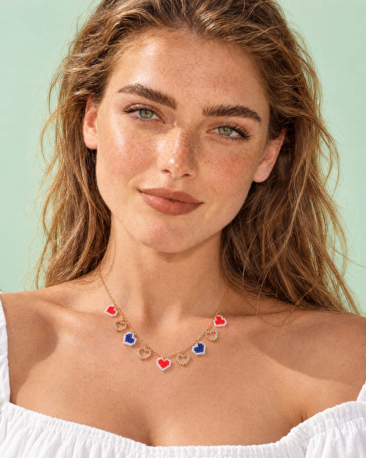 Heartline Charm Necklace worn at the collarbone