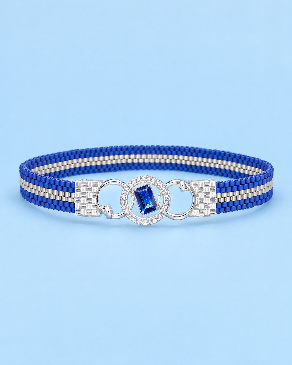 Cobalt Crystal Loom Cuff on blue background