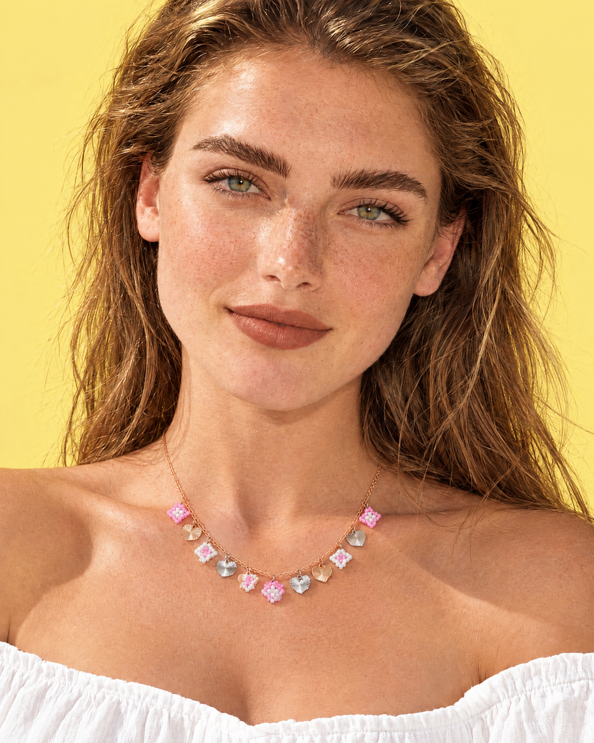 Sunburst Hearts Charm Necklace worn at the collarbone