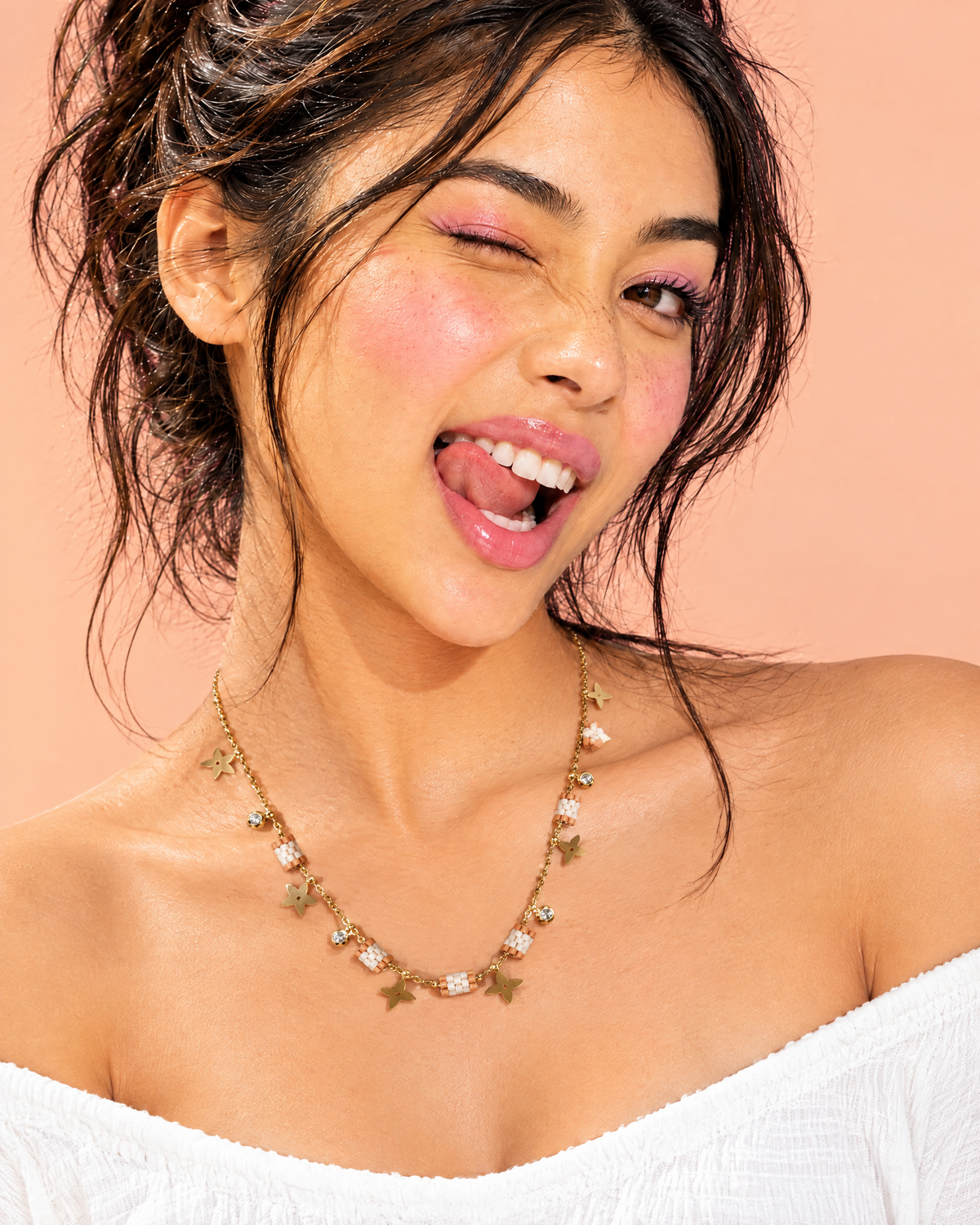 Model wearing the Terracotta Star Charm Necklace