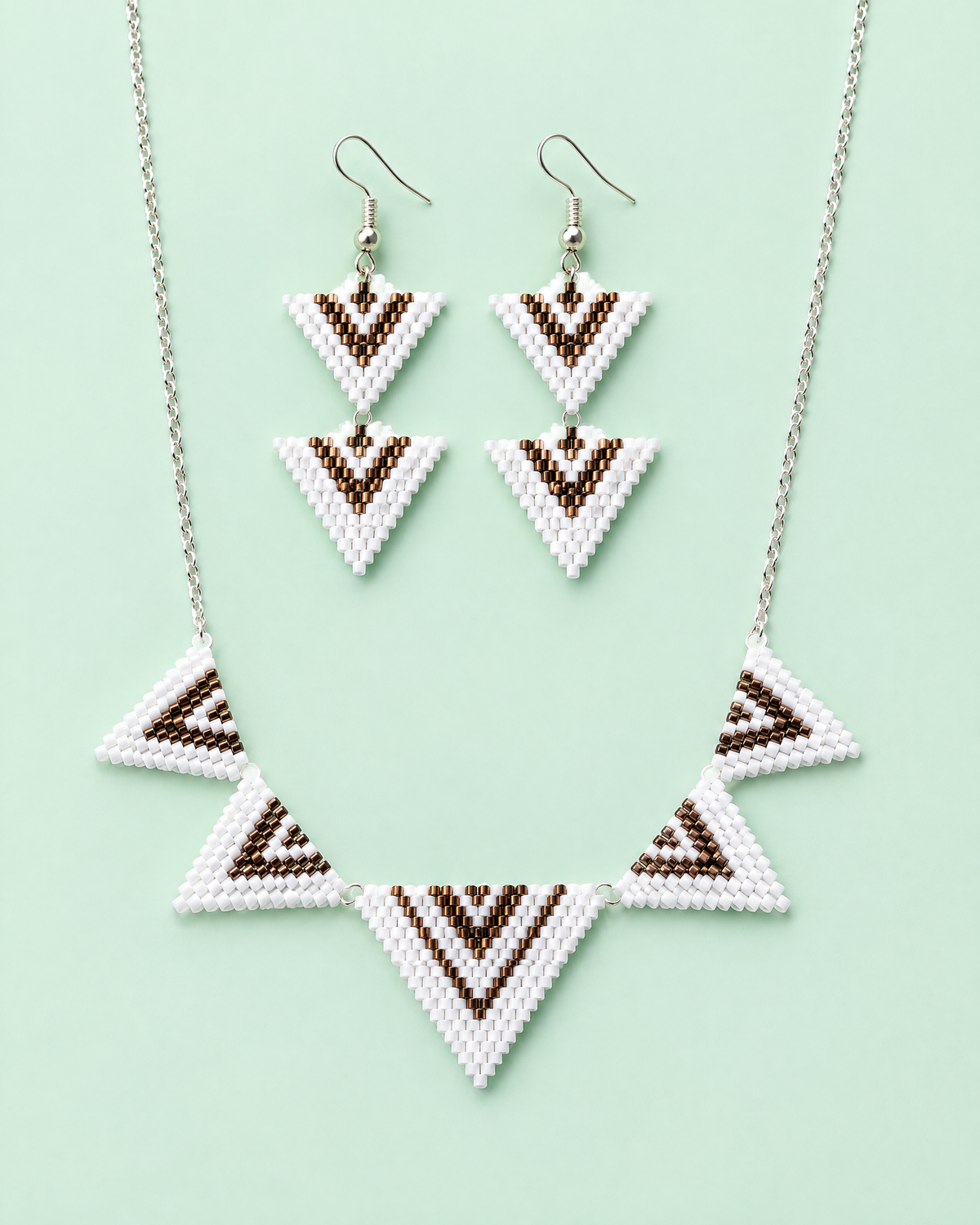 Chevron Triangle Necklace Set with matching earrings on mint background