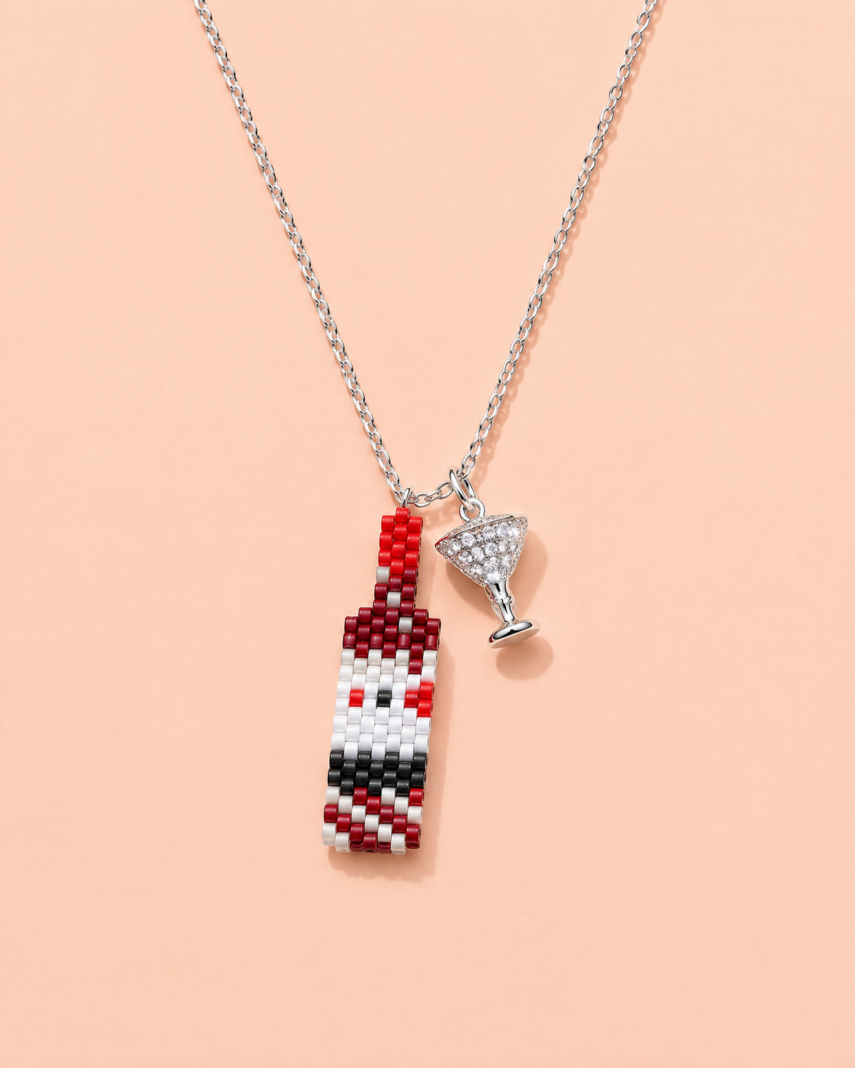Cheers Charm Necklace on peach background