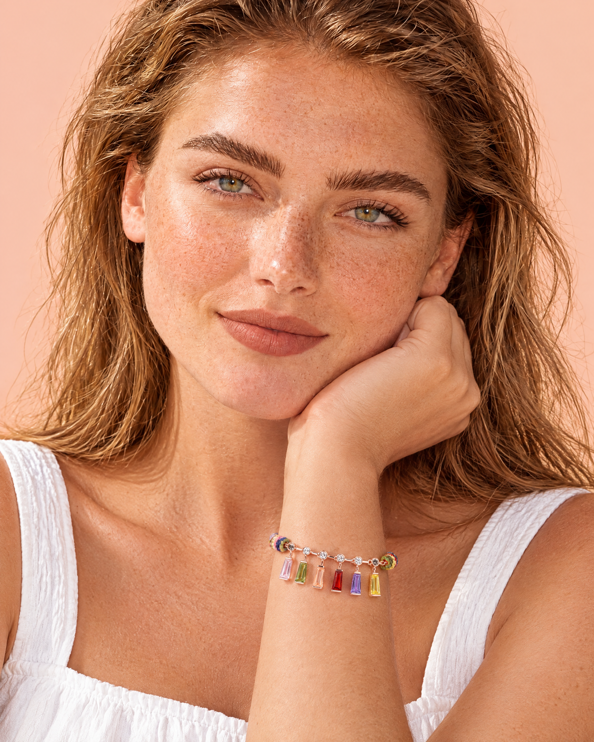Rainbow Baguette Charm Bracelet worn on the wrist