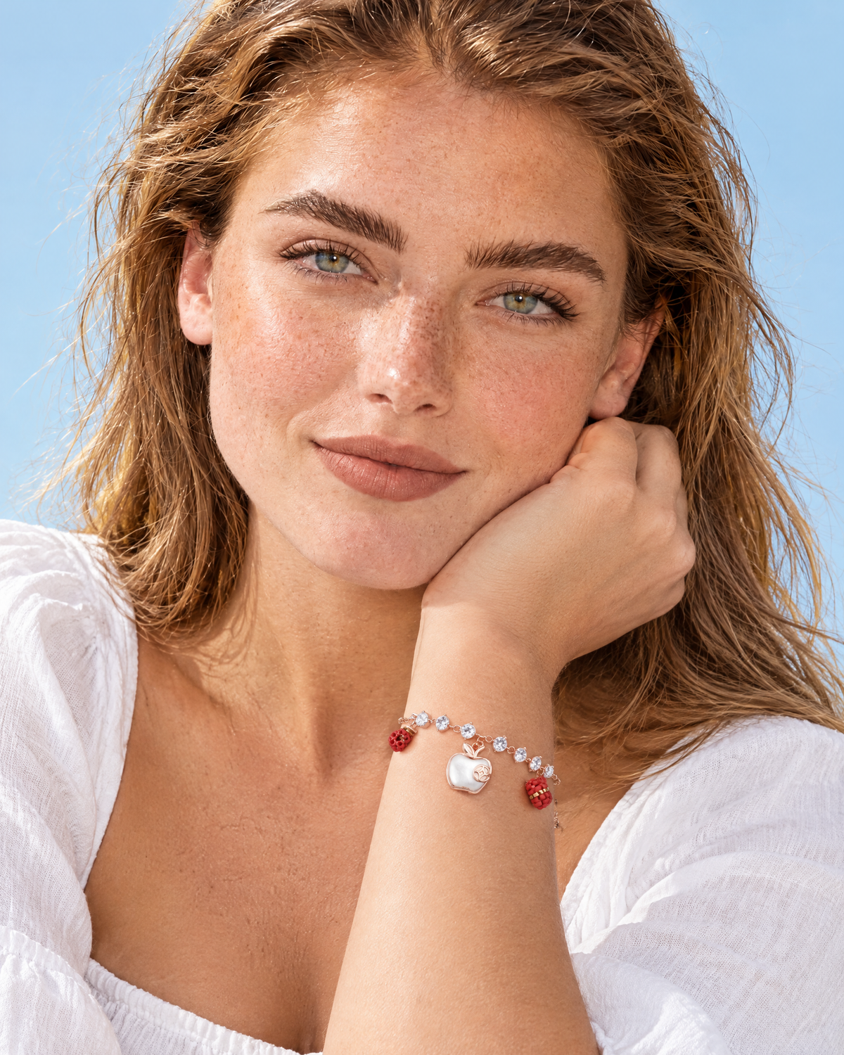 Crystal Apple Charm Bracelet worn on the wrist