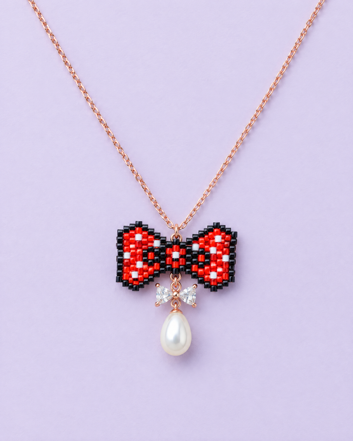 Polka Bow Pendant on lavender background