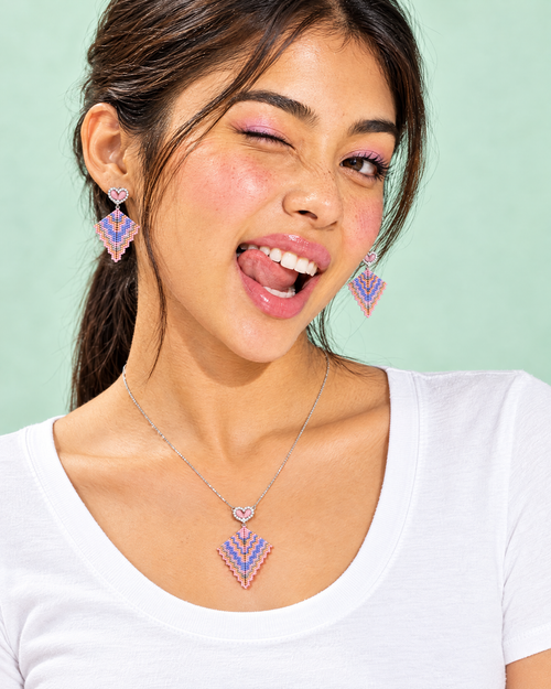 Model wearing the Pastel Kite Pendant and earrings