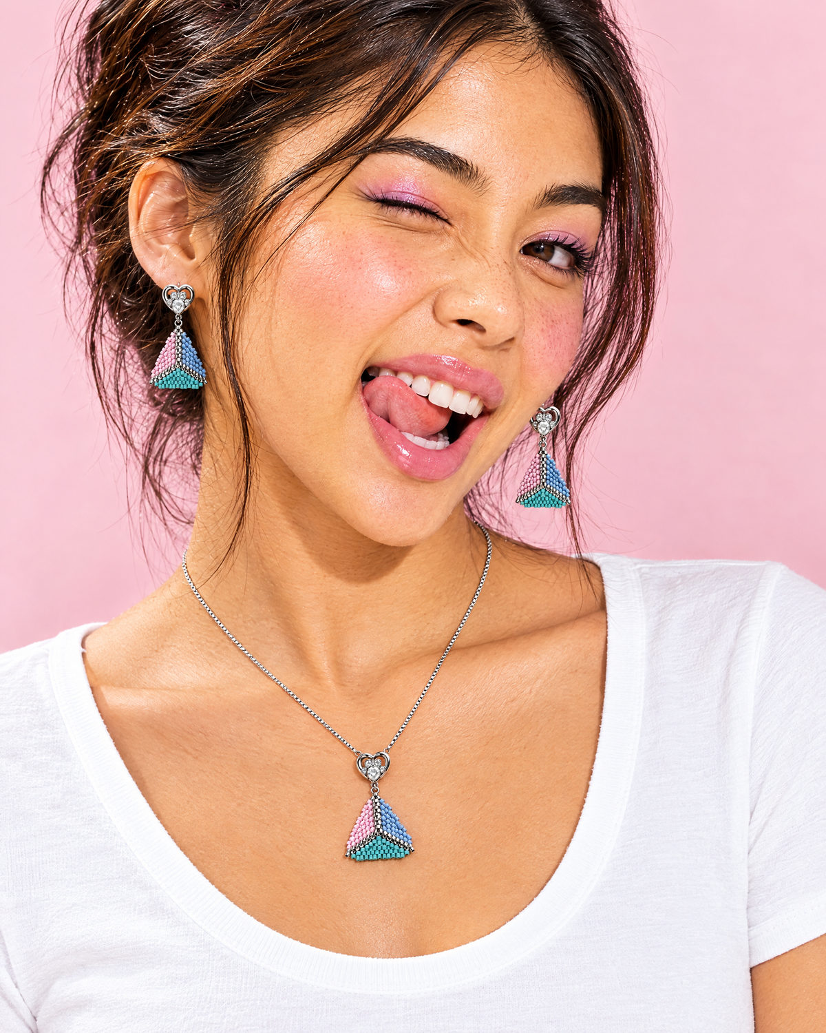 Model wearing the Pastel Pyramid pendant and earrings
