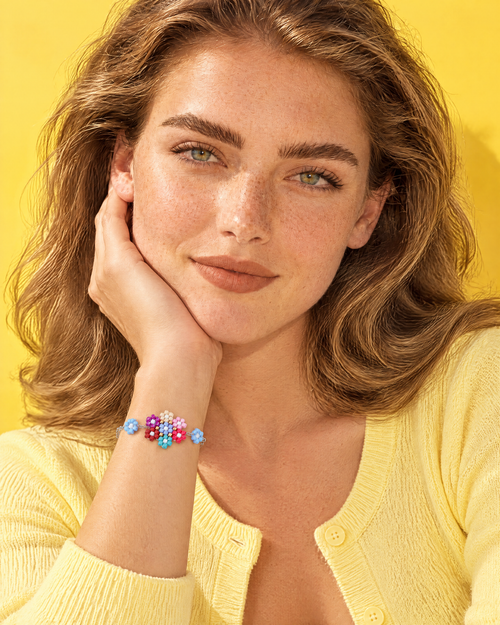 Blossom Cluster Charm Bracelet styled with a yellow cardigan