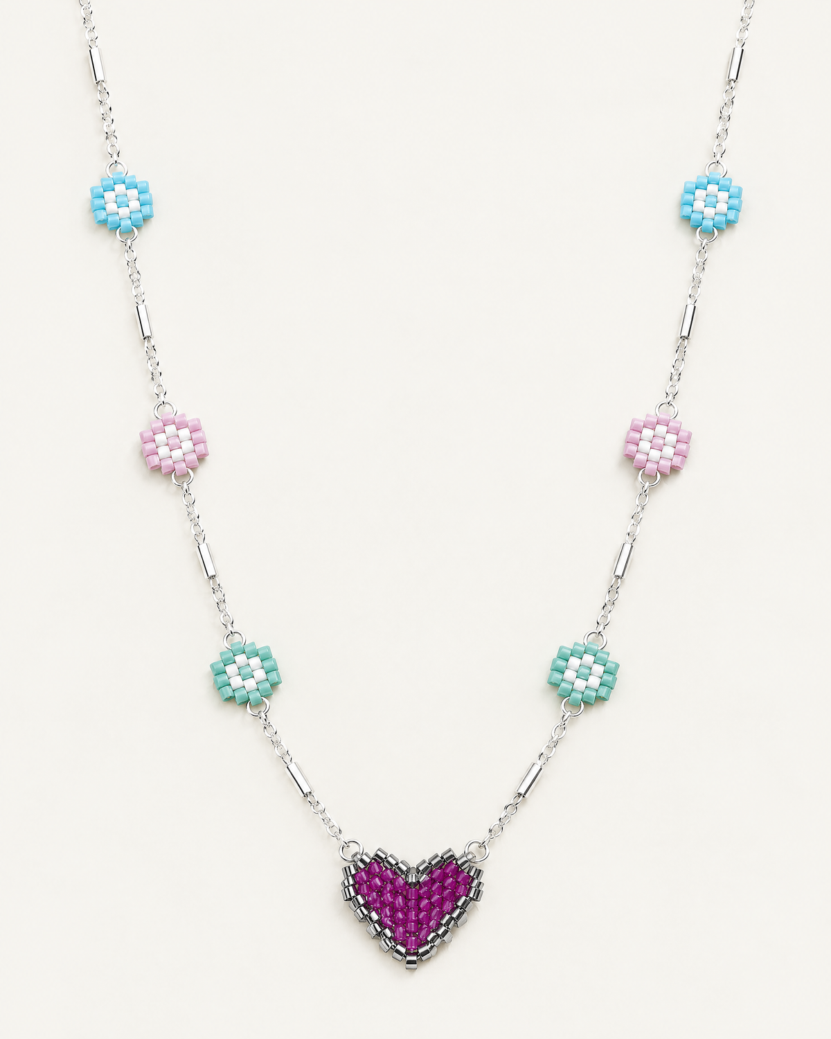 Daisy Heart Charm Necklace – silver chain with pastel beaded daisies and magenta Miyuki Delica heart pendant